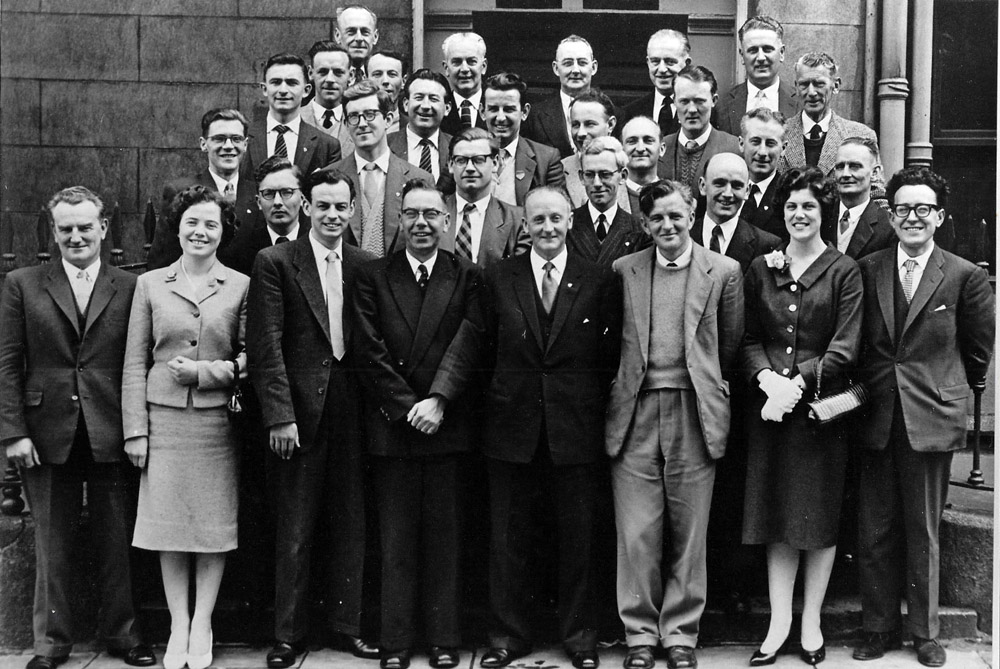 ESBOA First National Executive Meeting 1959 I'm looking for help to identify some of the delegates in the enclosed photo. The cluster of five top left and the middle two on the right beside the drain pipe. Replies please to ejkely@gmail.com.Any help will be greatly appreciated. Eddie Kelly Chairman Waterford RSA